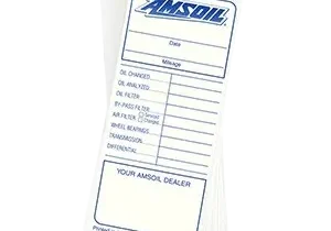 AMSOIL service checklist card on black background.