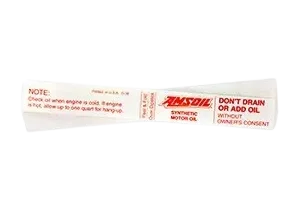 Oil change reminder tag with instructions.