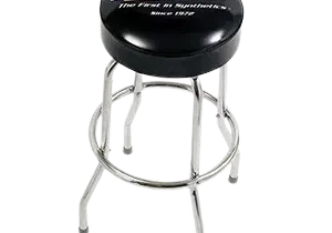 Bar stool with AMSOIL logo on seat.