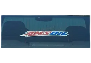 Car window with AMSOIL sticker displayed.
