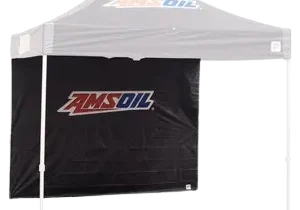 AMSOIL-branded canopy tent with black backdrop.
