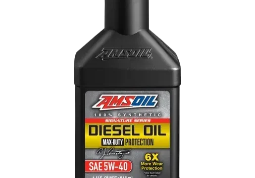 Amsoil diesel oil bottle, black background.