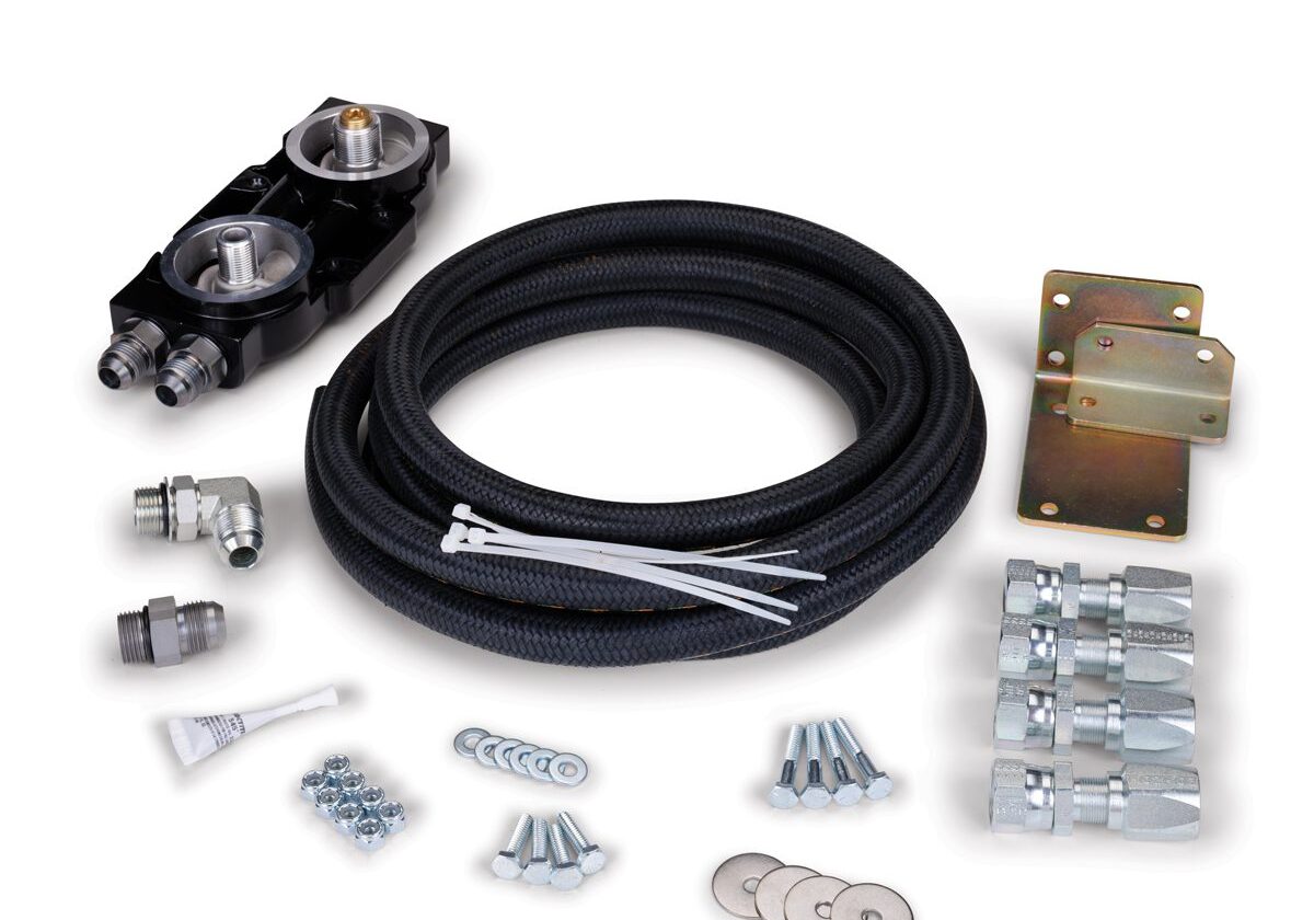 Hydraulic kit components with hoses and fittings.