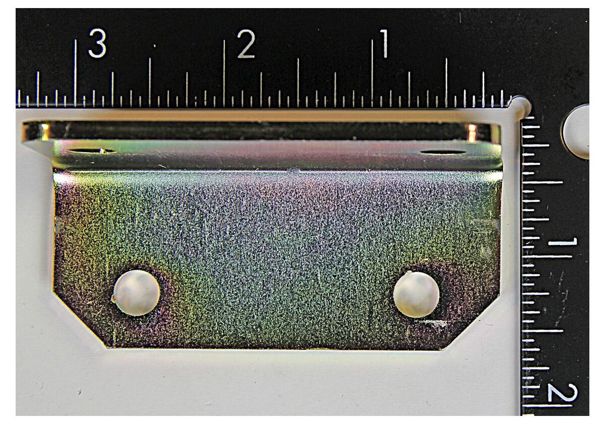 Metal bracket with measuring ruler.