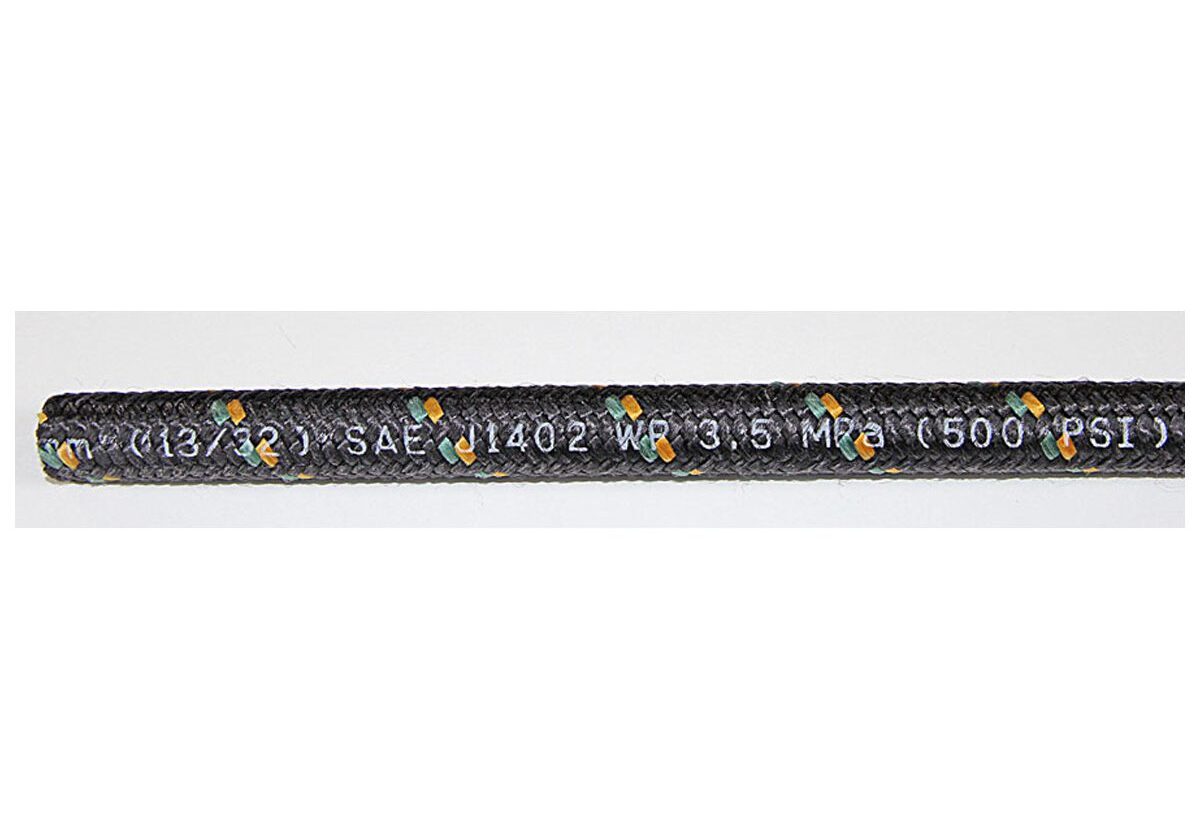 Black hydraulic hose with printed specifications.