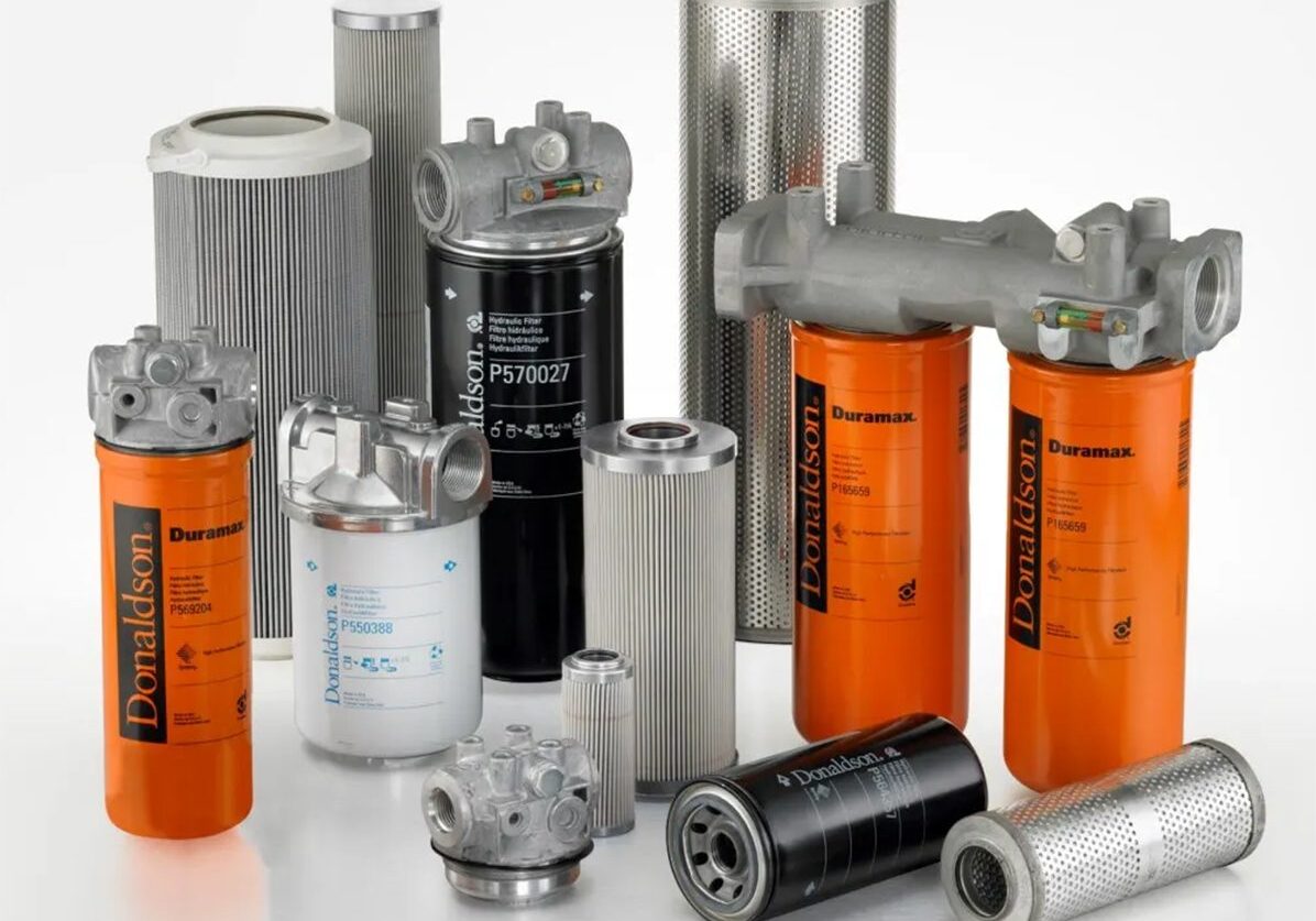 Various industrial filters on a white background.