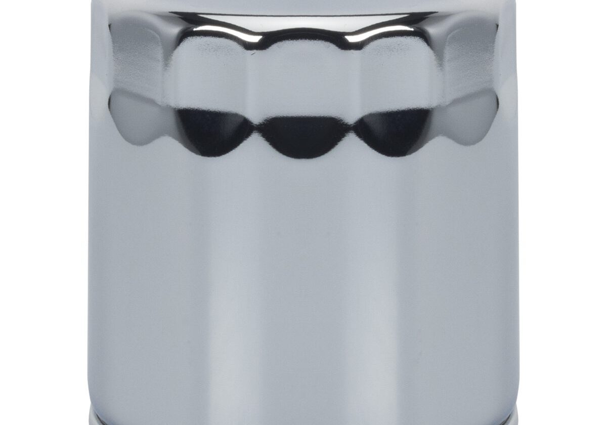 Chrome metal oil filter on white background.