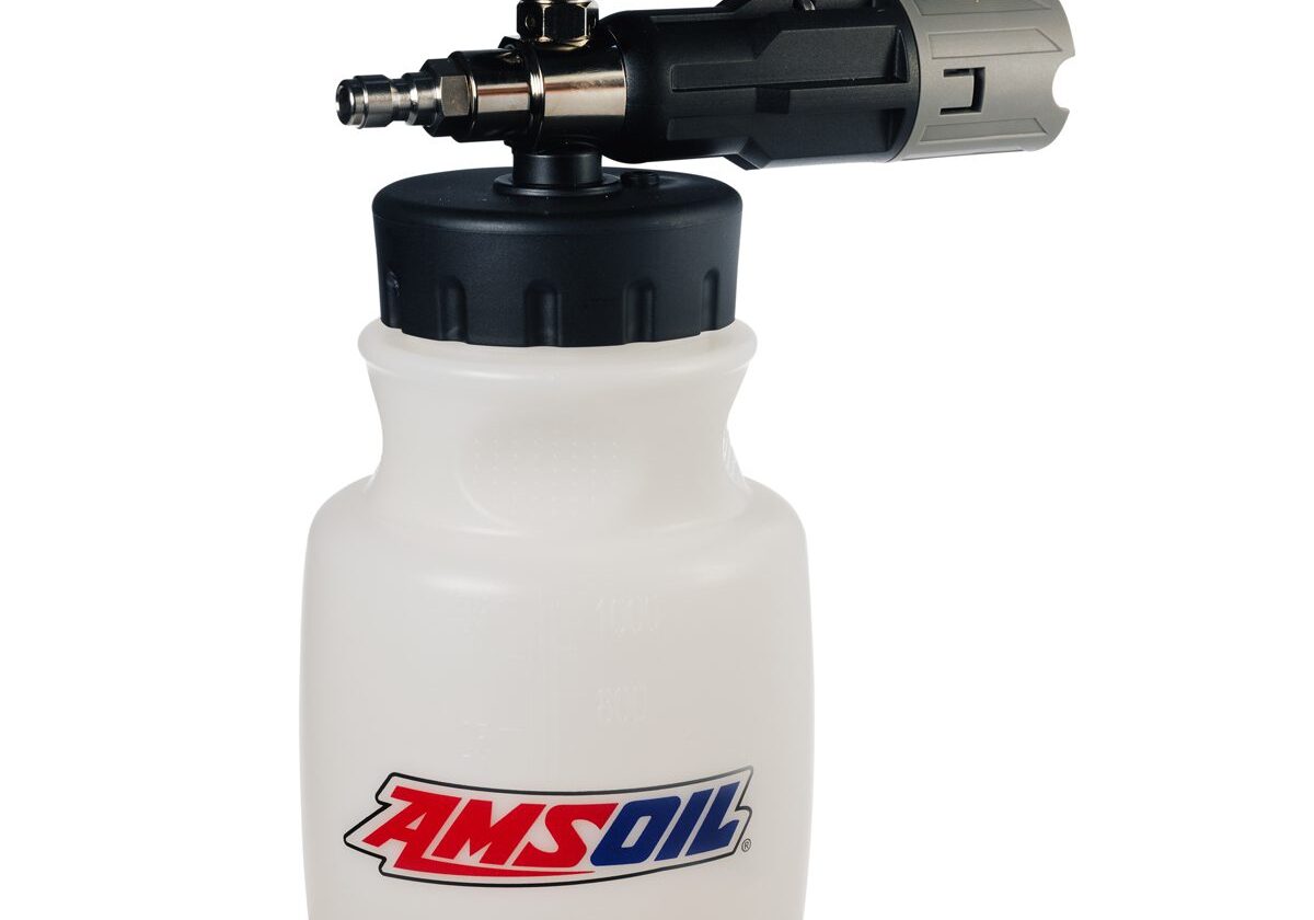 Foam sprayer with AMSOIL logo on bottle.