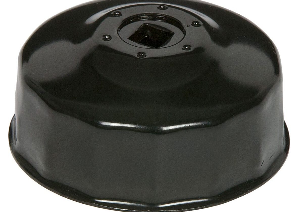 Black oil filter wrench on white background.