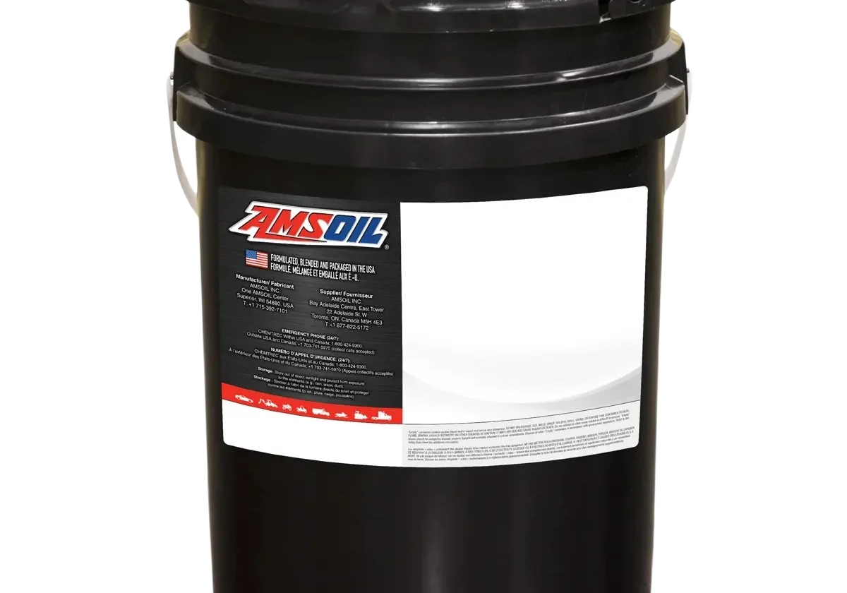 Black industrial oil drum with label.