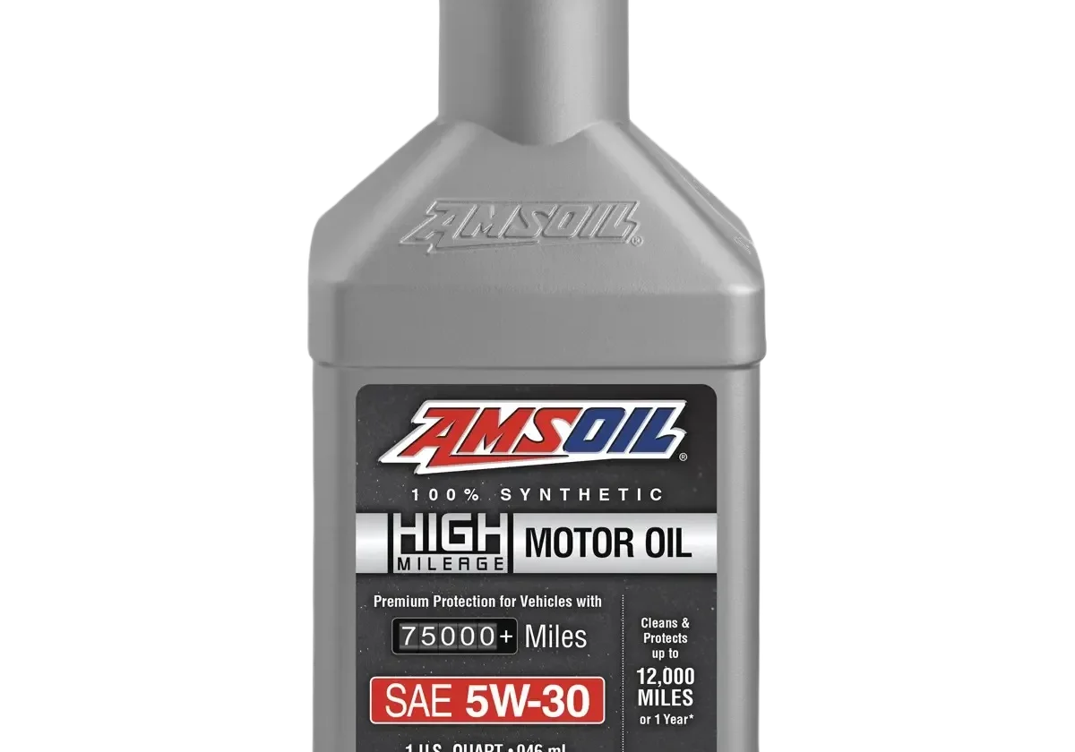 Amsoil motor oil bottle with red cap.