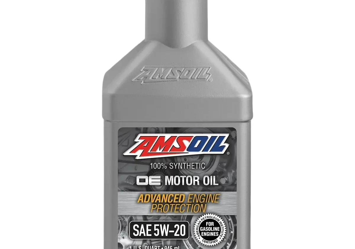 AMSOIL motor oil bottle, black background.